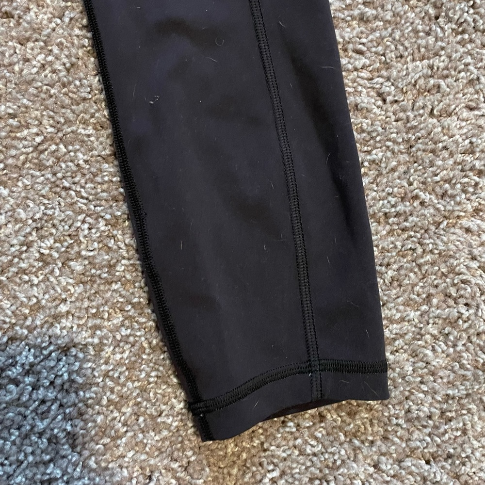 Lululemon invigorate size 4 leggings. With pockets.